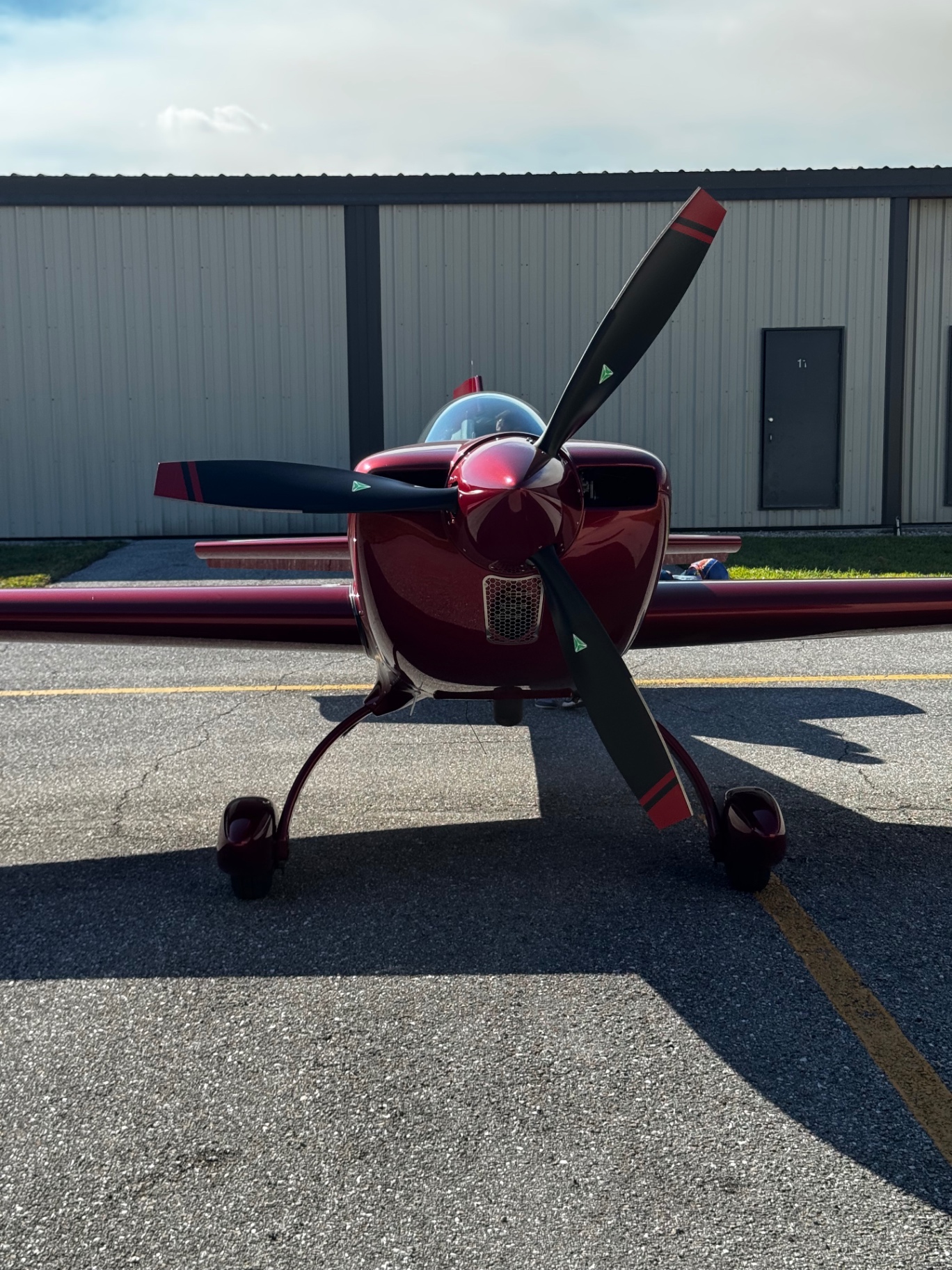 Extra 330 propeller and cowling on the ramp